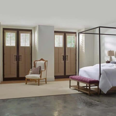 Shutters fitted to French doors in a bedroom