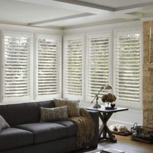 Living room with shutters from Value Blinds and Shutters